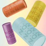 Load image into Gallery viewer, floating sunscreen sticks Nöz one purple, one blue, one yellow, one orange color nose application 
